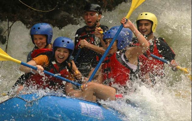 White water rafting on Pacuare River through tropical rainforest with professional guides and safety gear - Macaws Adventure Tours by Pablo C